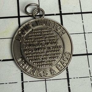 Louis Vuitton Trunks & Bags Silver charm. Two sided. Large